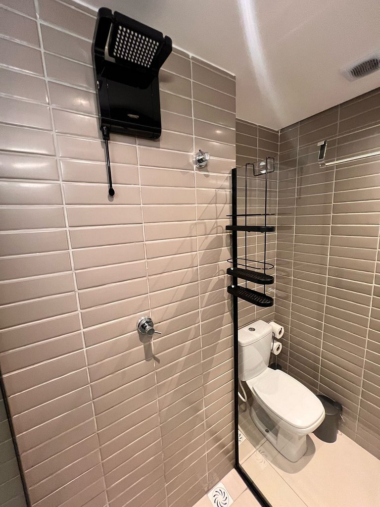 Flat pé na areia: acorde de frente pro mar