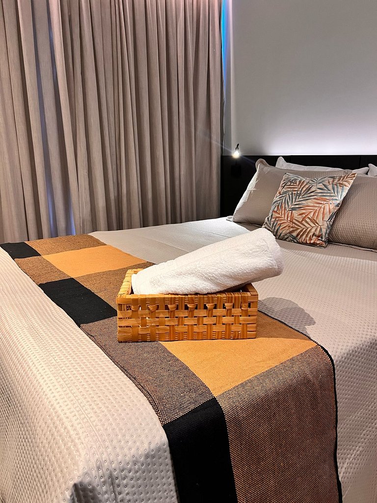 Flat pé na areia: acorde de frente pro mar