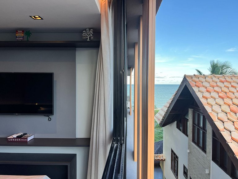 Flat pé na areia: acorde de frente pro mar