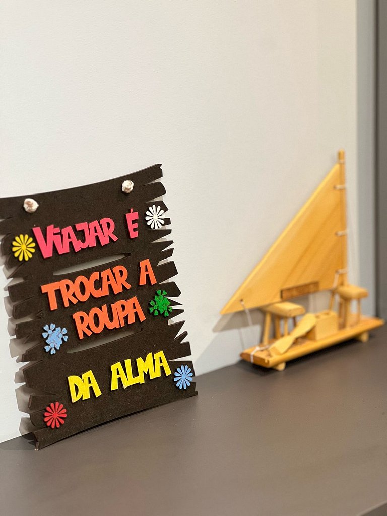 Flat pé na areia: acorde de frente pro mar