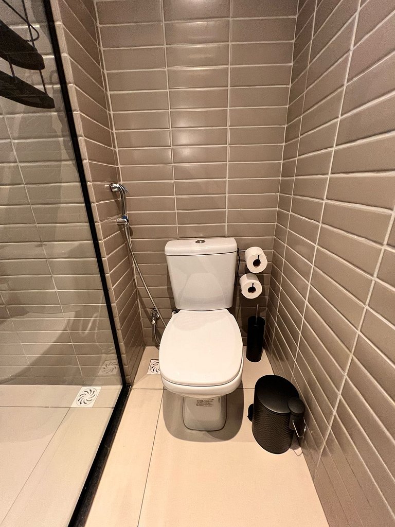 Flat pé na areia: acorde de frente pro mar