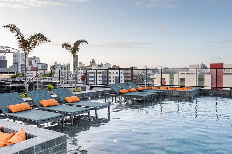 Flat pé na areia: acorde de frente pro mar