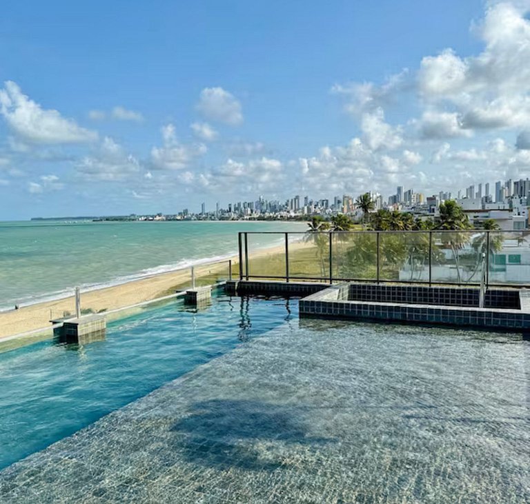 Flat à beira-mar com piscina