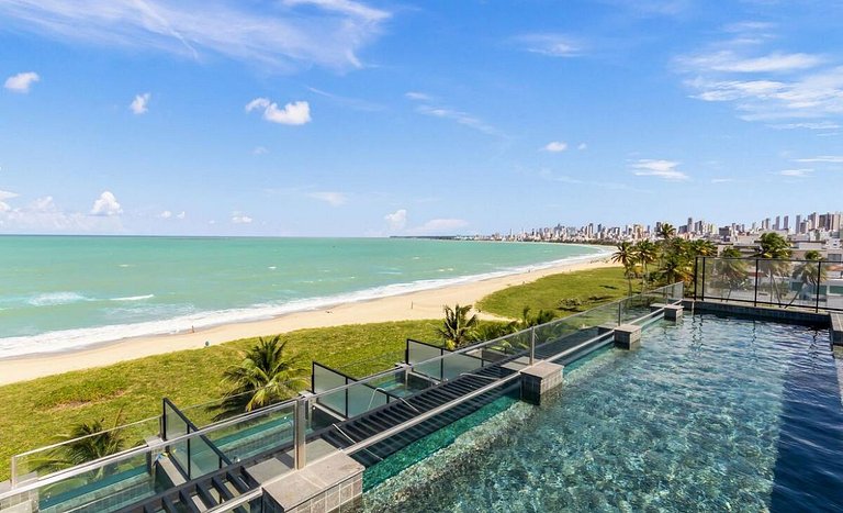 Flat pe na areia com piscina