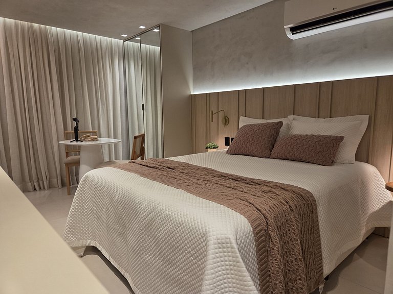 Flat pe na areia com piscina