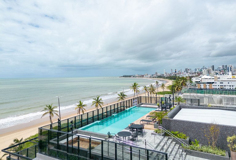 Flat Pé na Areia – Experiência Única no Mar