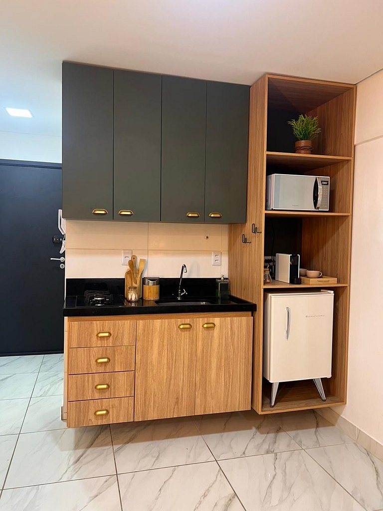 Flat completo poucos metros da praia